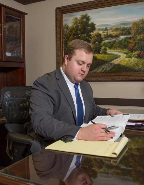 Attorney reviewing paperwork