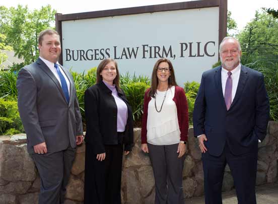 Photo of legal professionals outside the office of Burgess Law Firm, PLLC
